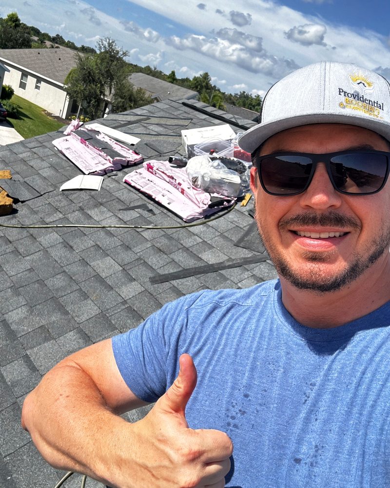 Clinton O’Brien of Providential Roofing on a roof replacement job