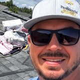 Clinton O’Brien of Providential Roofing on a roof replacement job